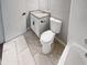 Bathroom with marble floors, granite countertop, and new fixtures at 4665 Garden Hills Dr, Stone Mountain, GA 30083