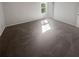 Bright main bedroom features a window, neutral colors and carpeted floors at 4665 Garden Hills Dr, Stone Mountain, GA 30083