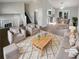 Bright living room with lots of natural light has cozy seating, neutral colors and an open floor plan at 4665 Garden Hills Dr, Stone Mountain, GA 30083