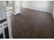 Open concept living area featuring hardwood floors, white trim, and plenty of natural light at 4665 Garden Hills Dr, Stone Mountain, GA 30083