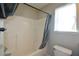 Bathroom with shower-tub combination, window for natural light, and neutral walls at 98 Brenda Cir, Rockmart, GA 30153