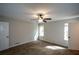 Bedroom with neutral walls, carpeted floor and natural light through a window at 98 Brenda Cir, Rockmart, GA 30153