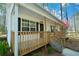 Detailed view of the charming front porch, perfect for enjoying the serene surroundings at 98 Brenda Cir, Rockmart, GA 30153