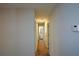 Hallway with neutral walls and carpeted flooring, leading to other rooms of the house at 98 Brenda Cir, Rockmart, GA 30153