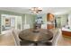Inviting dining area with stylish furniture and a view of the living room at 2655 Lakeside Trl, Cumming, GA 30041