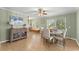 Inviting dining area with hardwood floors and storage cabinet at 2655 Lakeside Trl, Cumming, GA 30041