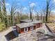 Cozy home with well-maintained yard and white picket fence detail at 2655 Lakeside Trl, Cumming, GA 30041