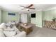 Comfortable living area featuring neutral color palette, cozy seating, and decor at 2655 Lakeside Trl, Cumming, GA 30041