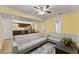 Open plan living space with two sofas, dining table, kitchen and hard surface floors at 2655 Lakeside Trl, Cumming, GA 30041