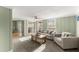 Inviting living room with neutral tones, stylish furniture, and plenty of natural light at 2655 Lakeside Trl, Cumming, GA 30041