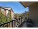 Relaxing balcony with seating overlooking lush landscaping and blue sky at 4805 W Village Se Way # 1302, Smyrna, GA 30080