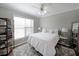 Bright bedroom features a comfortable bed with a window and ample natural light at 4805 W Village Se Way # 1302, Smyrna, GA 30080