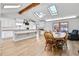 Bright kitchen with skylights, a breakfast bar, and modern appliances at 6828 Lockridge Dr, Atlanta, GA 30360