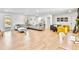 Bright living room with neutral tones, wood floors, and ample seating at 6828 Lockridge Dr, Atlanta, GA 30360