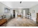 Spacious bedroom with wood floors, natural light, a walk-in closet, and a separate vanity area at 812 Bonnie Glen Se Dr, Marietta, GA 30067