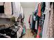 Walk-in closet with clothing racks on both sides, offering plenty of storage space at 812 Bonnie Glen Se Dr, Marietta, GA 30067