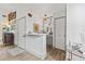 Inviting entryway featuring a decorative bar area, closet, and stylish decor throughout the space at 812 Bonnie Glen Se Dr, Marietta, GA 30067