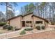 Charming home featuring stone accents, a covered entryway, and well-maintained landscaping at 812 Bonnie Glen Se Dr, Marietta, GA 30067