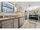 Spacious kitchen featuring granite countertops, stainless steel appliances, and ample natural light at 812 Bonnie Glen Se Dr, Marietta, GA 30067