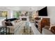 Comfortable living room with stone fireplace, wood-look flooring, and neutral decor, creating a relaxing and inviting atmosphere at 812 Bonnie Glen Se Dr, Marietta, GA 30067