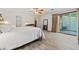 Main bedroom with wood-look flooring and a sliding glass door that provides private outdoor access at 812 Bonnie Glen Se Dr, Marietta, GA 30067