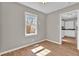 This dining room offers wood floors and access to the kitchen at 1883 Clarke Ln, Decatur, GA 30035