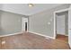 This living room offers wood floors, neutral paint, and an open layout at 1883 Clarke Ln, Decatur, GA 30035
