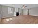Spacious living room features wood floors, a fireplace, and plenty of natural light at 1883 Clarke Ln, Decatur, GA 30035
