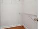 Walk-in closet with wire shelving and hardwood floors at 3923 Ashford Lake Ne Ct, Brookhaven, GA 30319