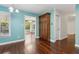 Dining space with dark hardwood floors and view to outdoor patio at 3923 Ashford Lake Ne Ct, Brookhaven, GA 30319
