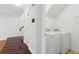 A conveniently located laundry room with modern appliances and easy access from the hallway at 3923 Ashford Lake Ne Ct, Brookhaven, GA 30319