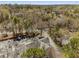 Aerial of condo complex highlighting mature landscaping, parking areas, and roof structures at 102 Barrington Hills Dr, Atlanta, GA 30350