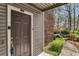 Front door entrance to condo unit with keyless entry at 102 Barrington Hills Dr, Atlanta, GA 30350