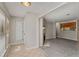 Inviting living room with fireplace and a seamless transition to the kitchen at 102 Barrington Hills Dr, Atlanta, GA 30350