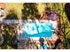 Aerial view of a backyard pool and patio area, showcasing the layout and landscaping of the outdoor space at 2272 Kimberley Way, Snellville, GA 30078