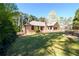 Spacious backyard featuring lush greenery, ideal for outdoor activities at 2272 Kimberley Way, Snellville, GA 30078