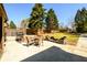Backyard with a patio, including an outdoor dining area, perfect for gatherings at 2272 Kimberley Way, Snellville, GA 30078