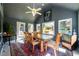 Bright dining room features a vaulted ceiling, lots of natural light, and backyard views at 2272 Kimberley Way, Snellville, GA 30078