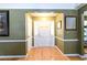Welcoming foyer with hardwood floors, paneled walls, and a bright front door at 2272 Kimberley Way, Snellville, GA 30078