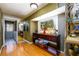 Hallway with mirrored wall and a window showcasing the outdoors, perfect for adding depth and natural light at 2272 Kimberley Way, Snellville, GA 30078