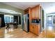Spacious kitchen leading to a home office, stainless steel appliances, and hardwood floors at 2272 Kimberley Way, Snellville, GA 30078