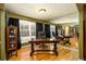 Home office with hardwood floors, ample natural light, and plenty of room for productivity at 2272 Kimberley Way, Snellville, GA 30078