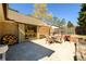 Outdoor patio space with ample seating and a charming brick barbecue at 2272 Kimberley Way, Snellville, GA 30078