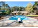 Inviting backyard pool and lounge area, perfect for warm weather enjoyment at 2272 Kimberley Way, Snellville, GA 30078