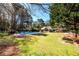 Expansive backyard with a refreshing pool, perfect for summer relaxation at 2272 Kimberley Way, Snellville, GA 30078