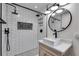 Modern bathroom with subway tile shower, matte black fixtures, and stylish vanity at 118 Raven Rd, Villa Rica, GA 30180