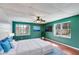 Large bedroom featuring natural light and a ceiling fan at 118 Raven Rd, Villa Rica, GA 30180