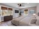 Bedroom features natural light, dresser, and TV at 118 Raven Rd, Villa Rica, GA 30180