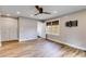 Bedroom featuring a ceiling fan, wood floors, and a closet for ample storage at 118 Raven Rd, Villa Rica, GA 30180
