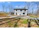 Exterior view of a two-story home with a paved driveway at 118 Raven Rd, Villa Rica, GA 30180